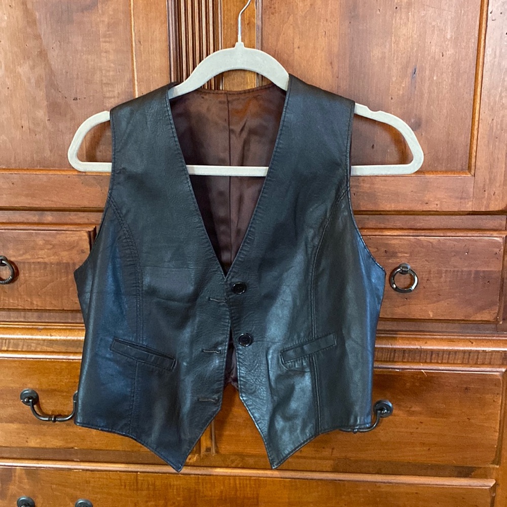 Black leather vest with brown lining
